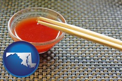 maryland map icon and chopsticks and red hot sauce in a Chinese restaurant
