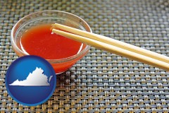 virginia map icon and chopsticks and red hot sauce in a Chinese restaurant