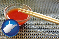 west-virginia map icon and chopsticks and red hot sauce in a Chinese restaurant