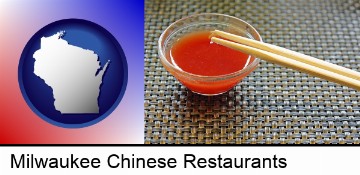 chopsticks and red hot sauce in a Chinese restaurant in Milwaukee, WI