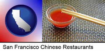 chopsticks and red hot sauce in a Chinese restaurant in San Francisco, CA